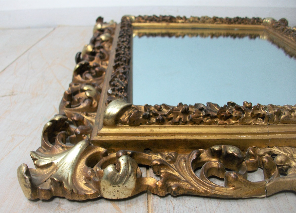 Florentine gilded carved and foliate scroll frame